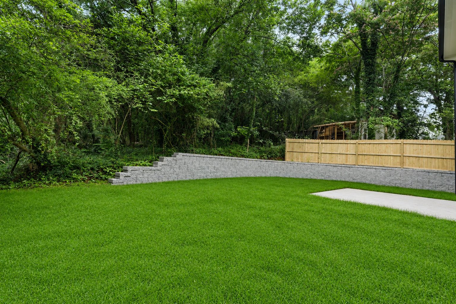 Level backyard with retaining wall